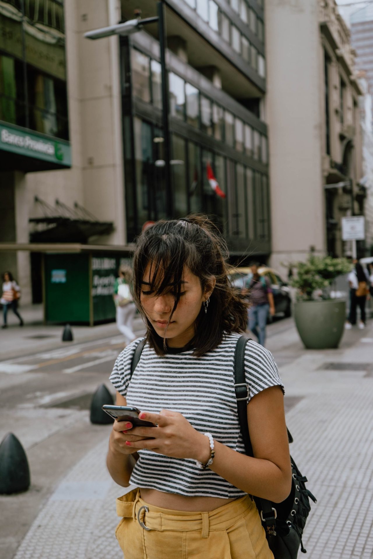 woman looking at phone