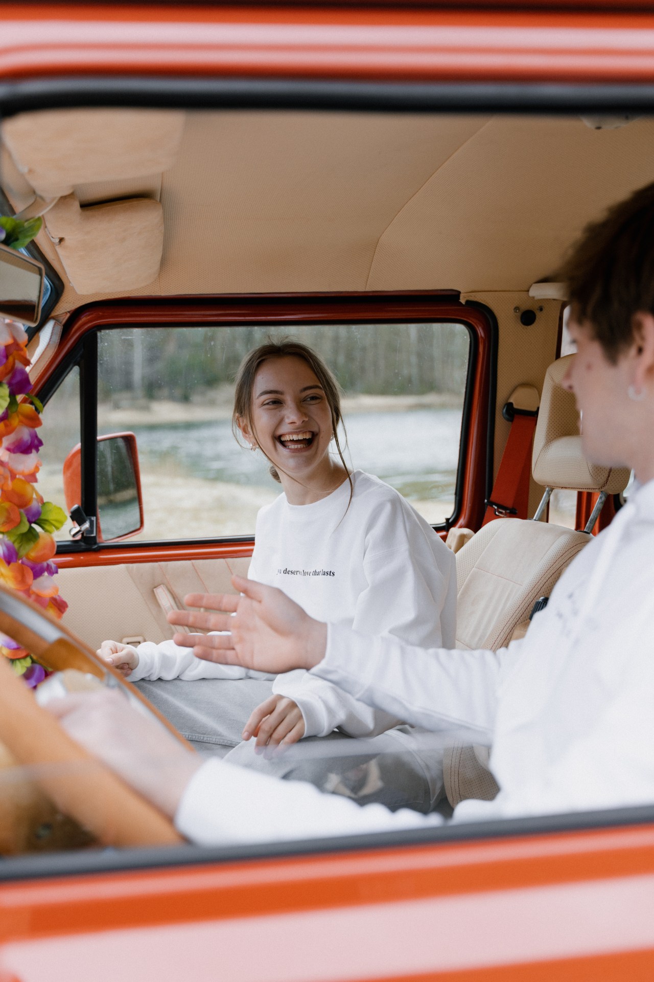 Woman Laughing in a Car