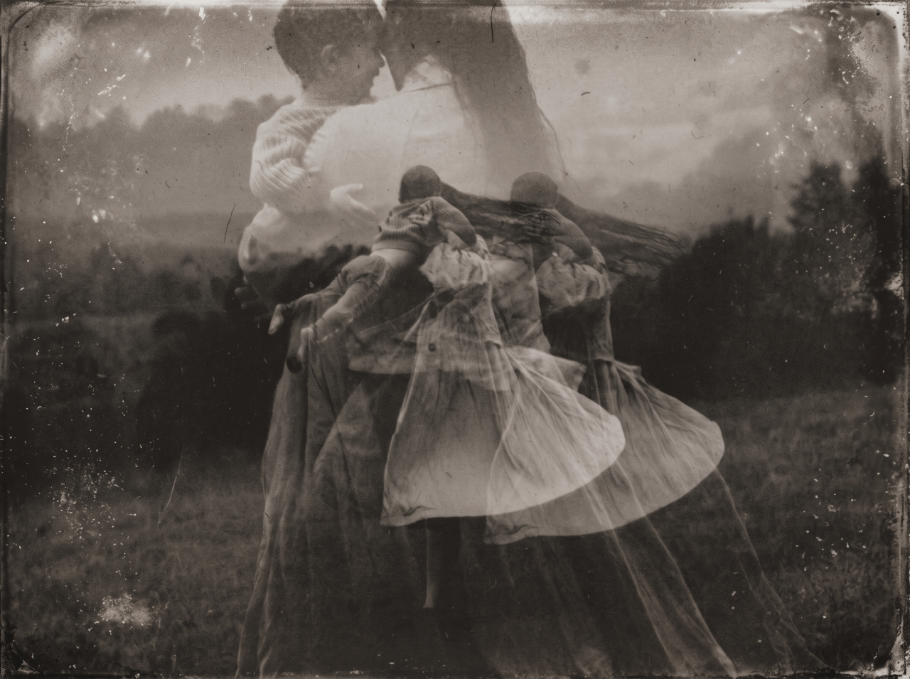 Sepia-toned double-exposure of two figures embracing and dancing outdoors, their forms layered and blurred to suggest motion across time.